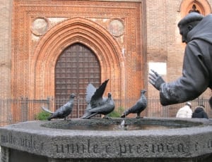 priest and doves concrete statute thumbnail