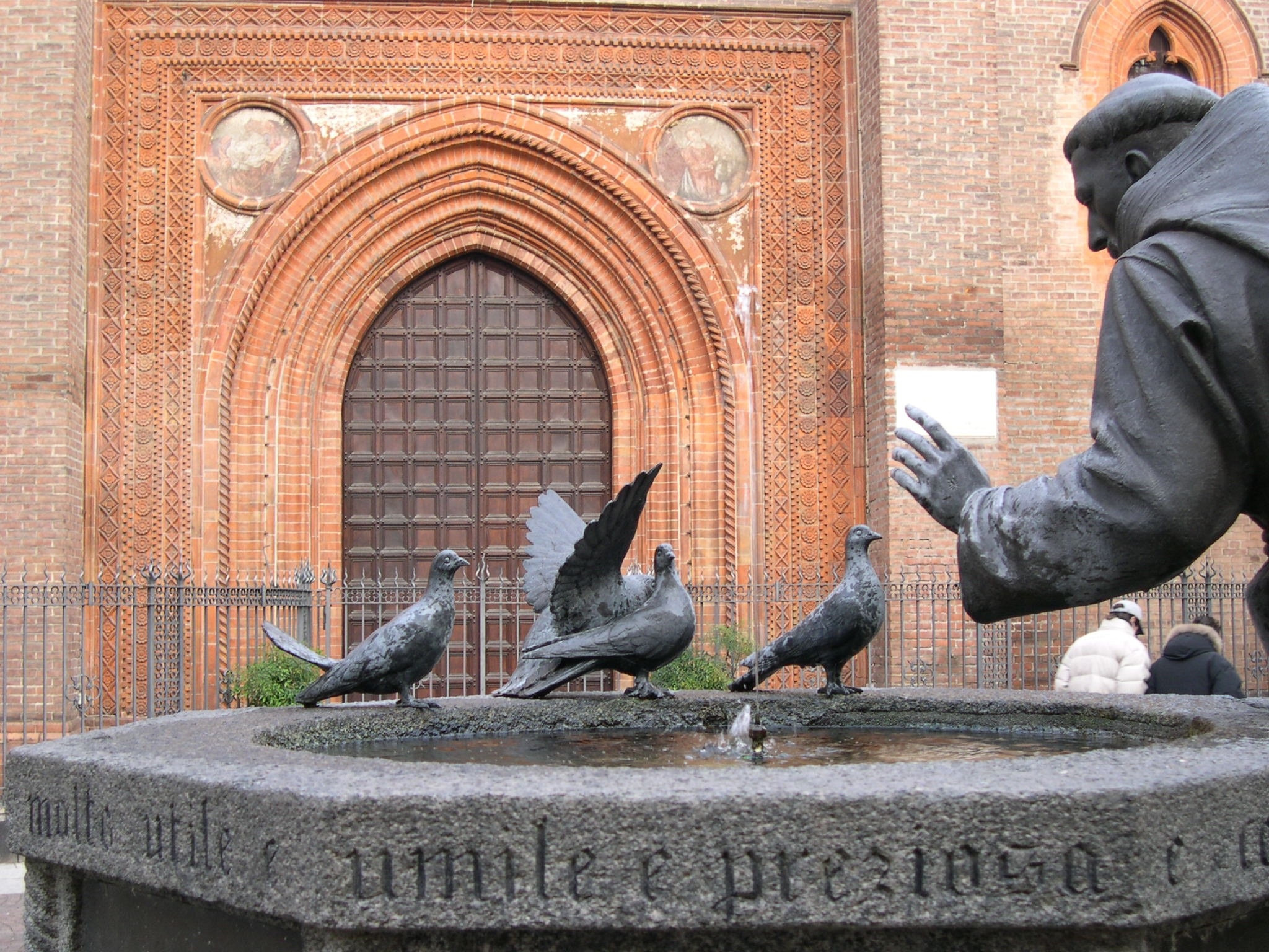 priest and doves concrete statute