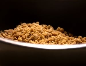 brown crumbs in a stainless steel bowl thumbnail