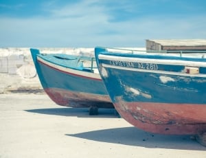 shallow focus photography of blue boats thumbnail