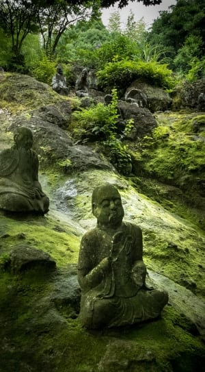 gray buddha stone carvings thumbnail