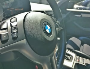 black bmw multi function steering wheel thumbnail