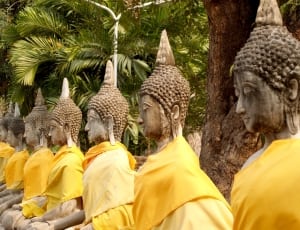 meditating buddha statues thumbnail
