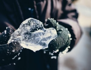 person holding ice formation thumbnail