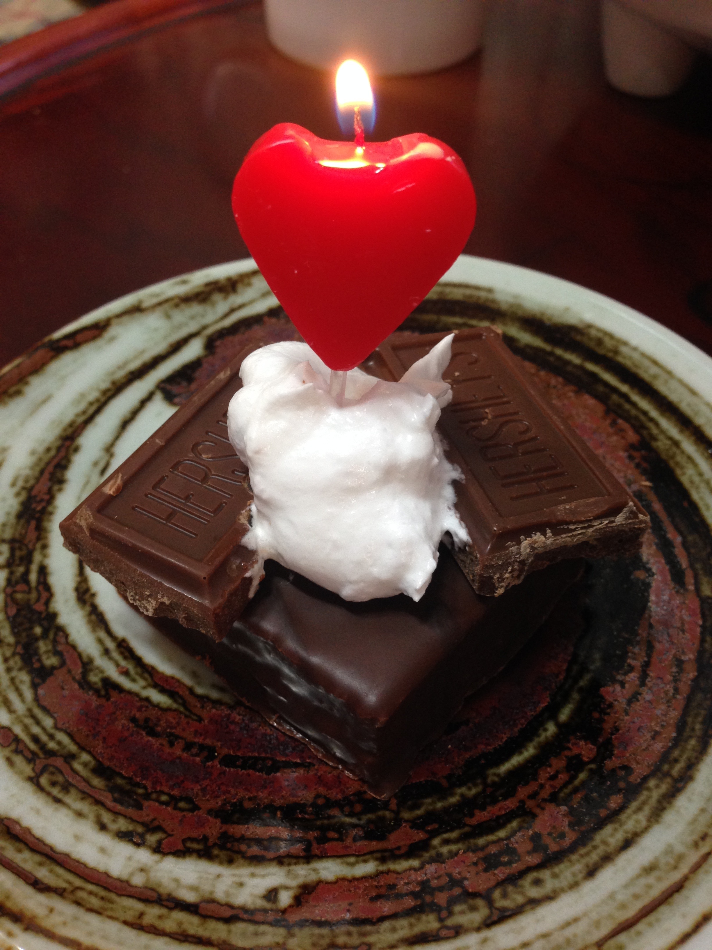 red heart candle and hersheys chocolate bar