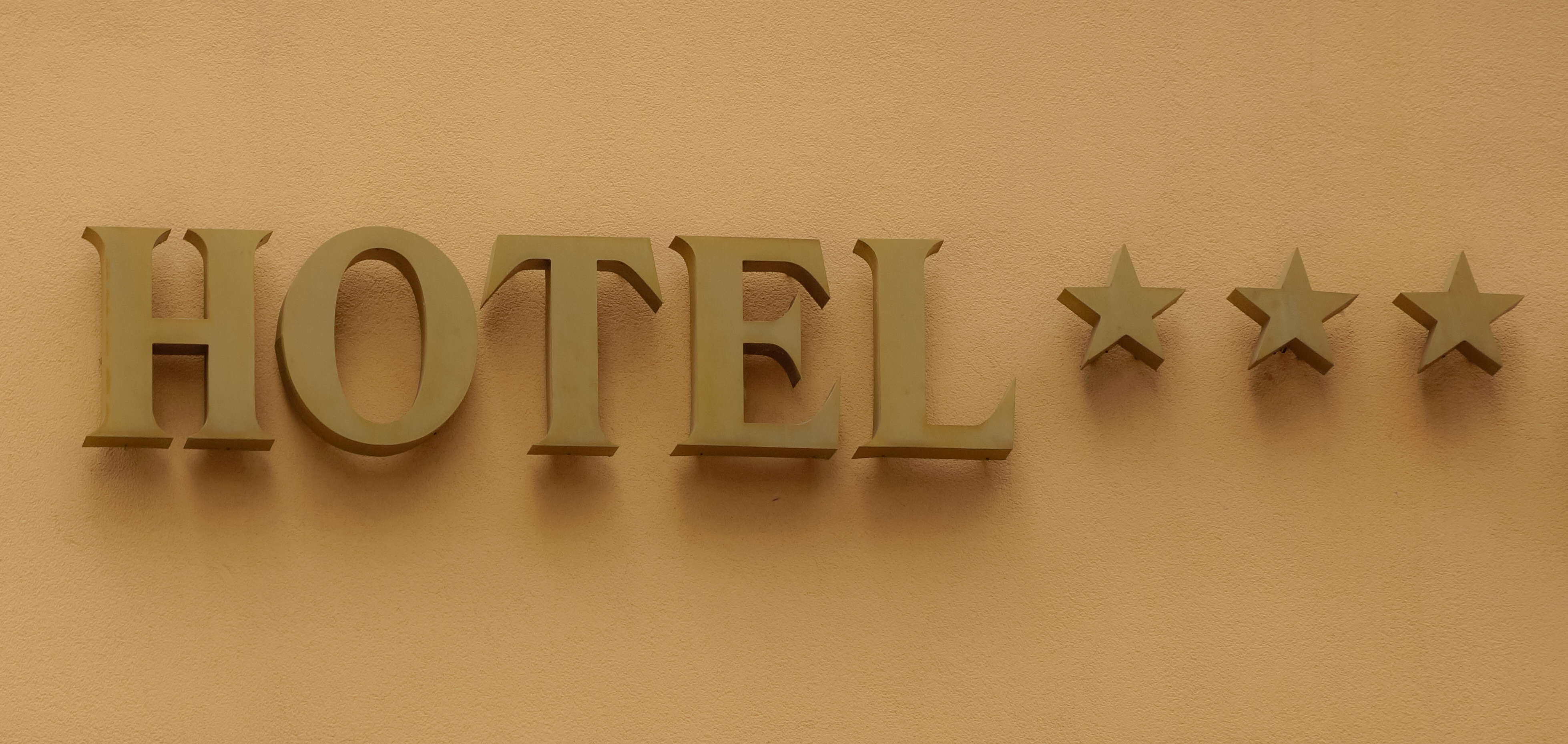 brown hotel signage