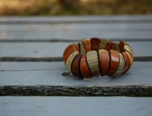 brown and gray wooden beaded bracelets thumbnail