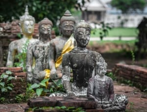 4 buddha concrete statuette thumbnail