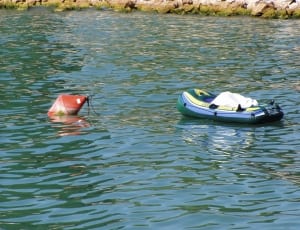 blue and green inflatable boat thumbnail