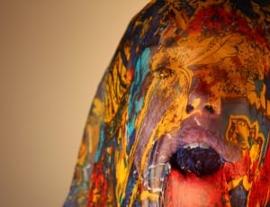 multi colored head bust figurine thumbnail