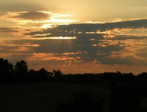 sun covered by clouds photo thumbnail