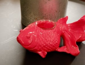 red goldfish figurine thumbnail