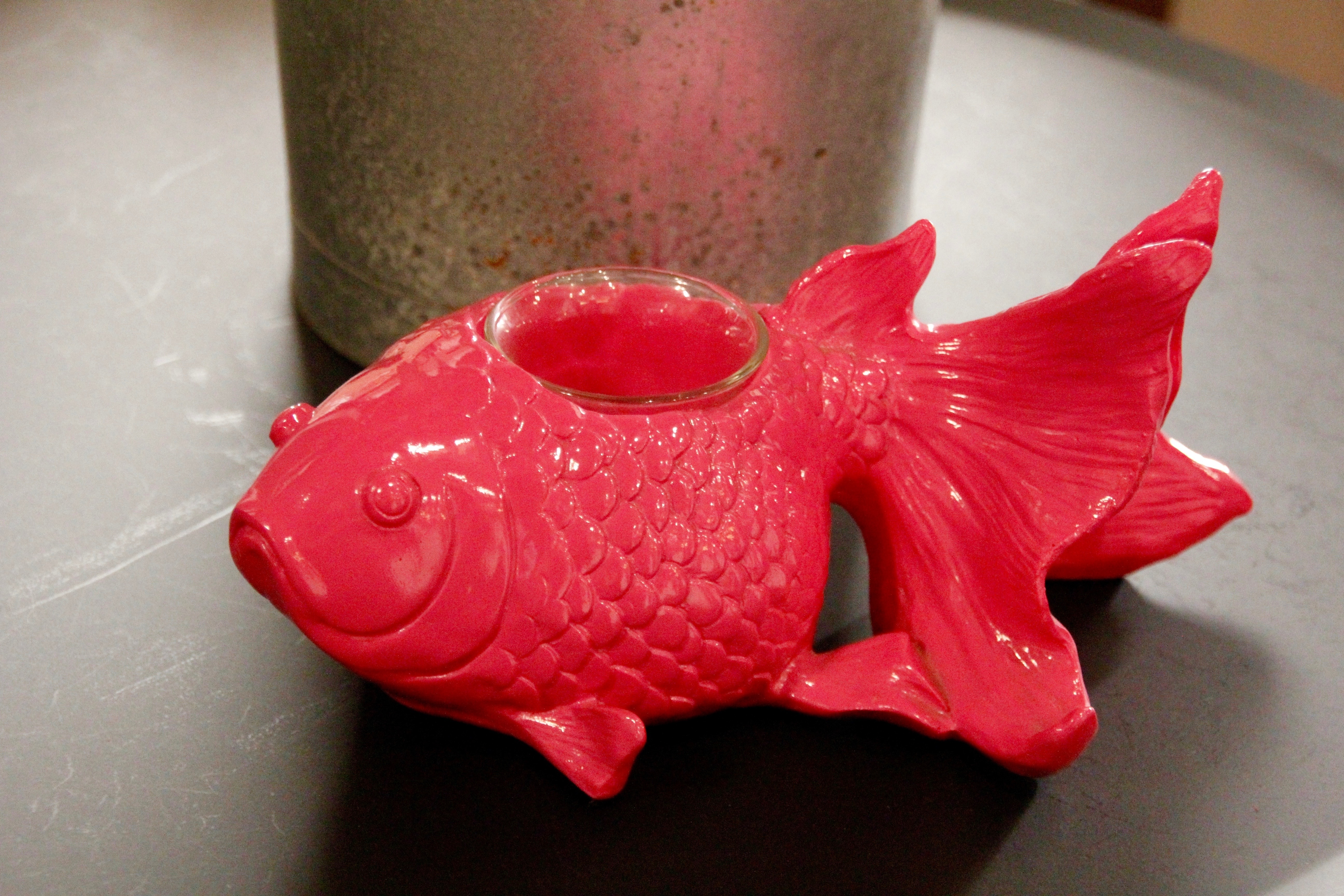 red goldfish figurine