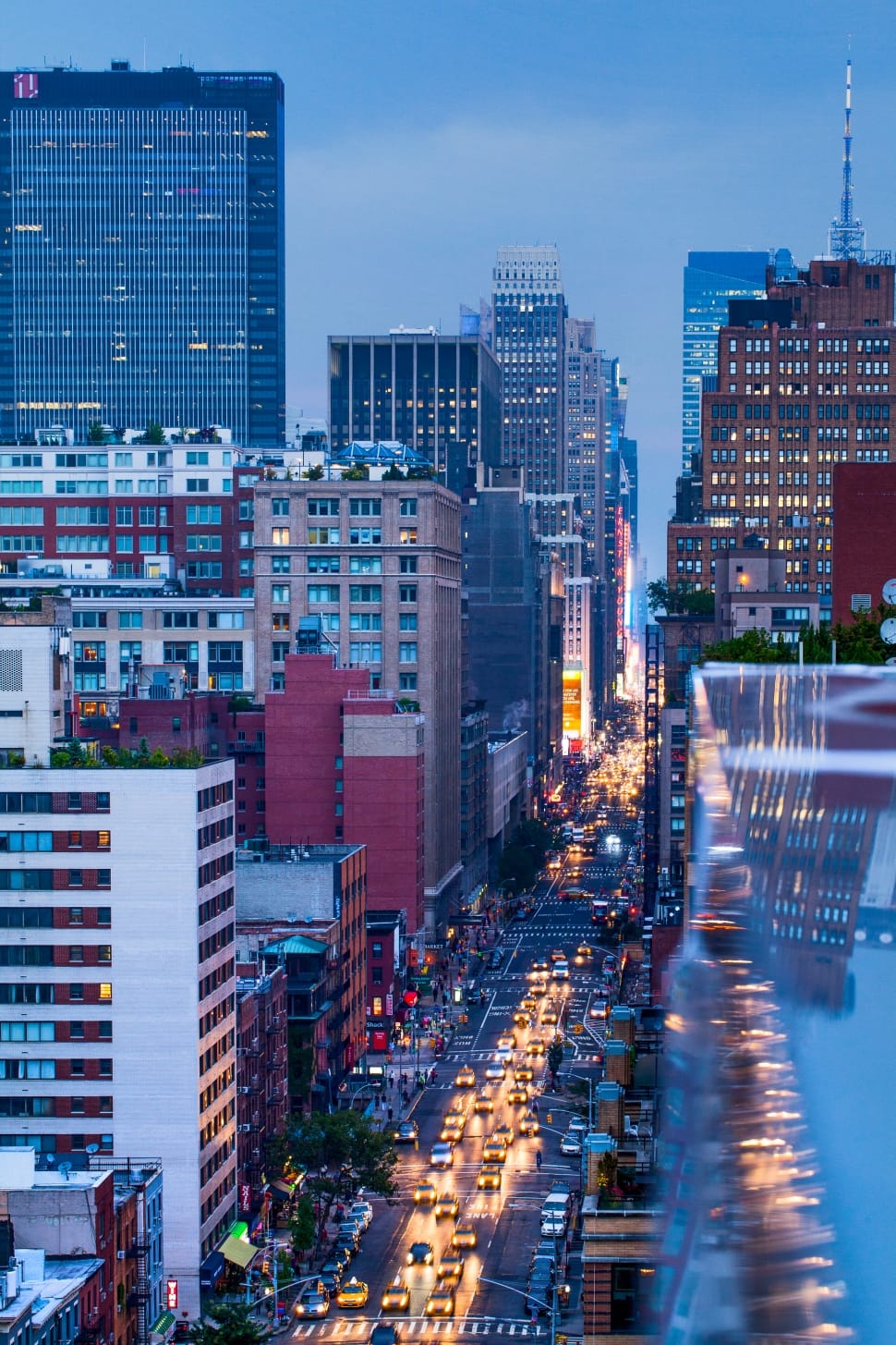 photo of heavy and busy streets surrounded by high rise buildings preview