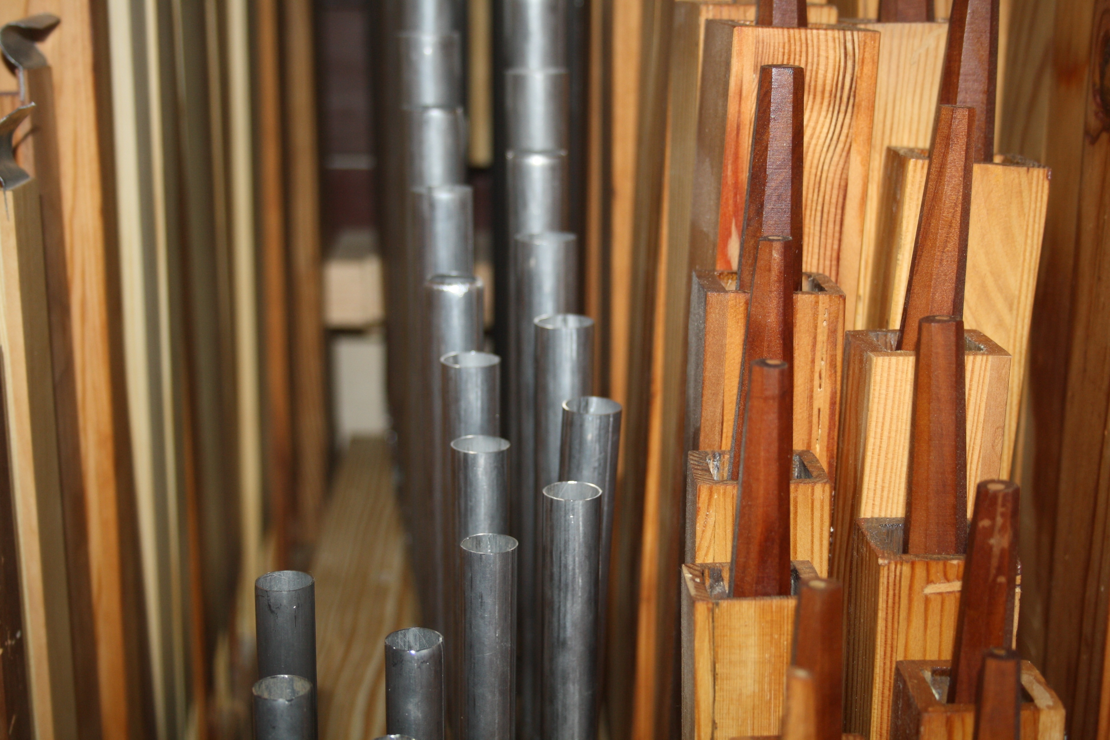 brown wooden and gray metal tubes and bars