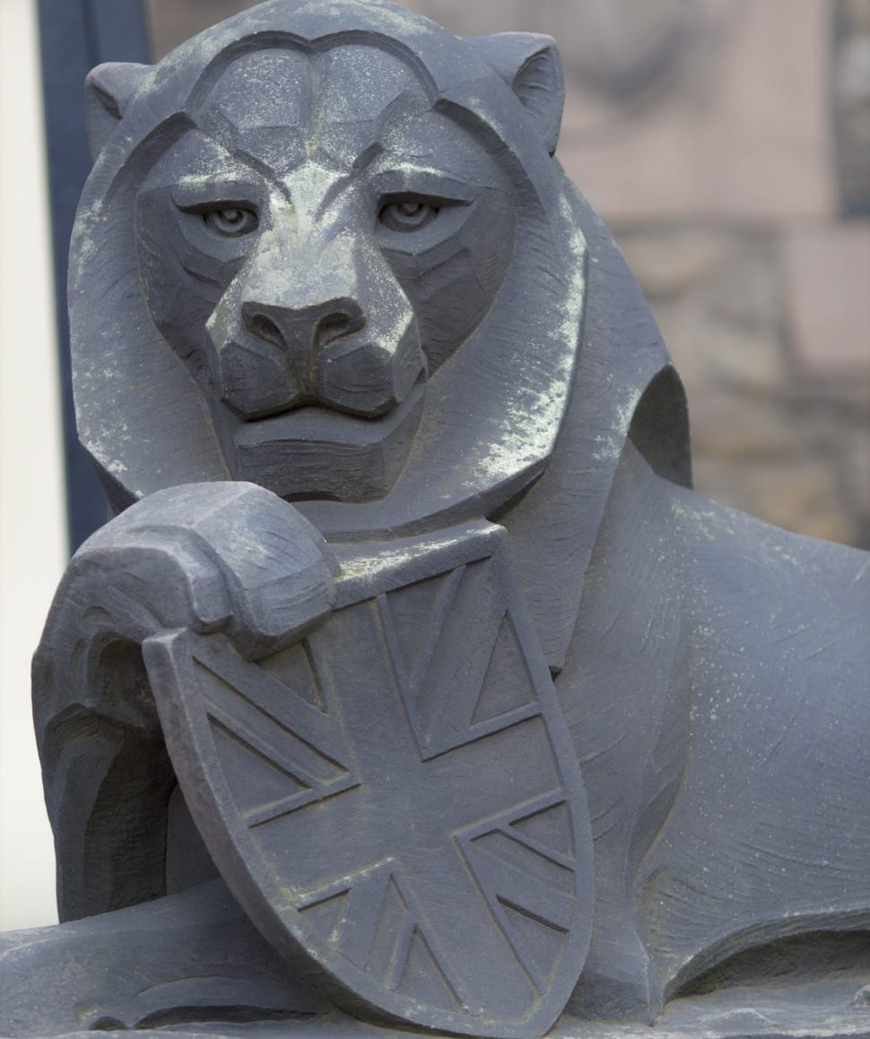 lion holding shield emblem statue preview