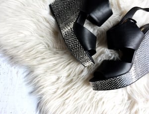 pair ofg women's black platform wedge shoes on white fuzzy textile thumbnail