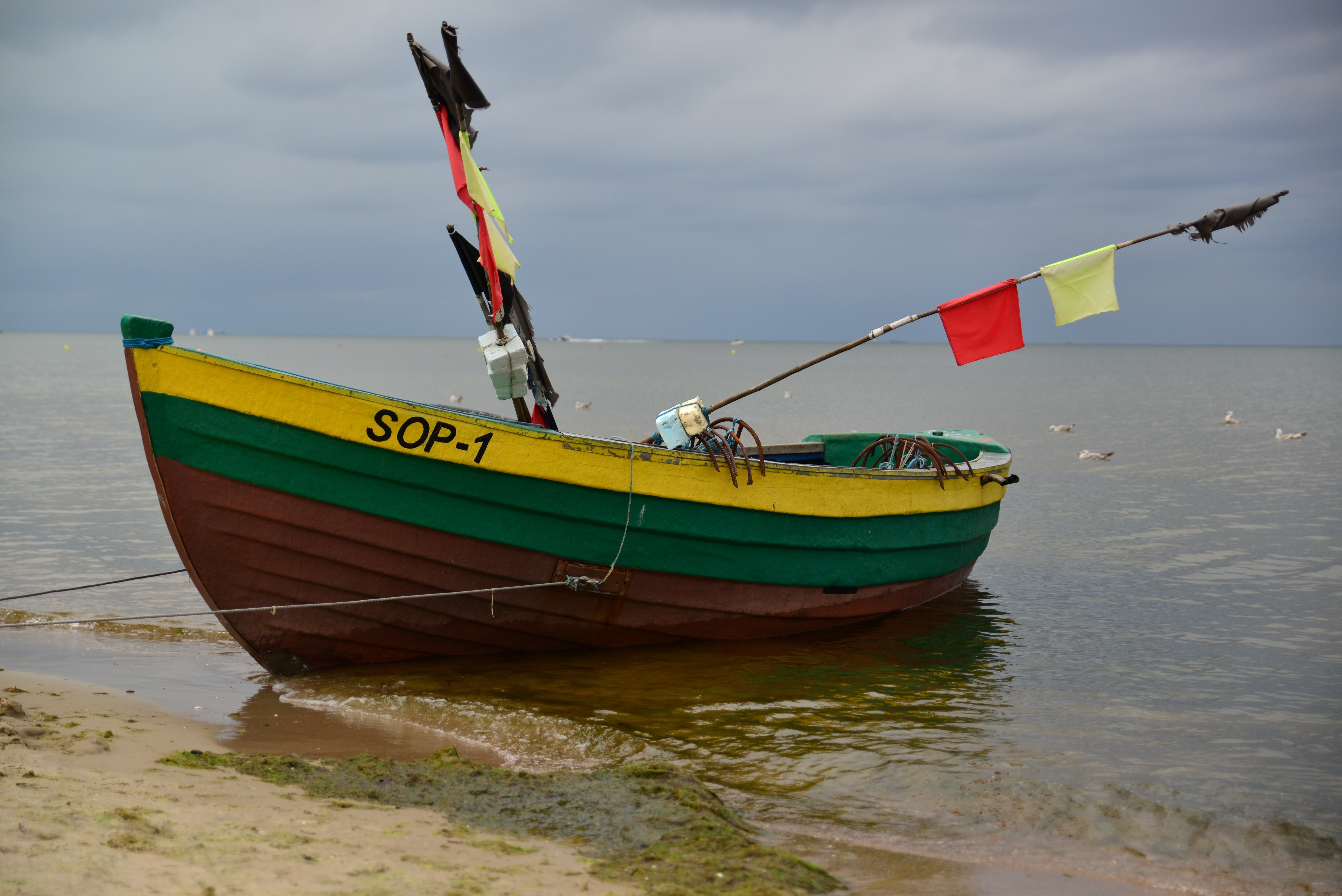 yellow green and brown boat