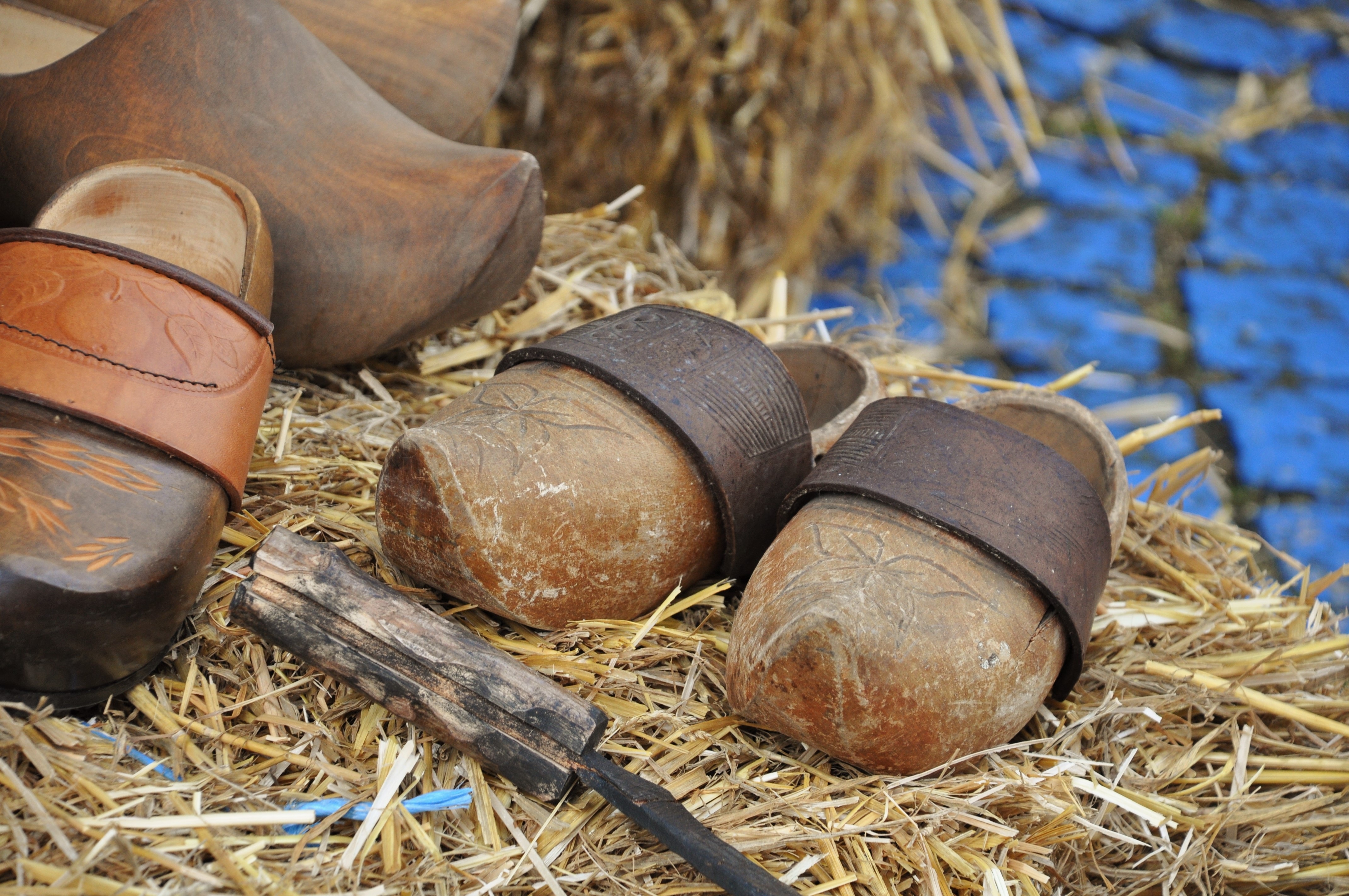 pair of brown wooden clogs