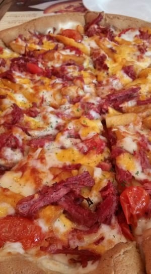 pizza with cheese and ham slice thumbnail