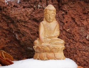 brown wooden figurine thumbnail