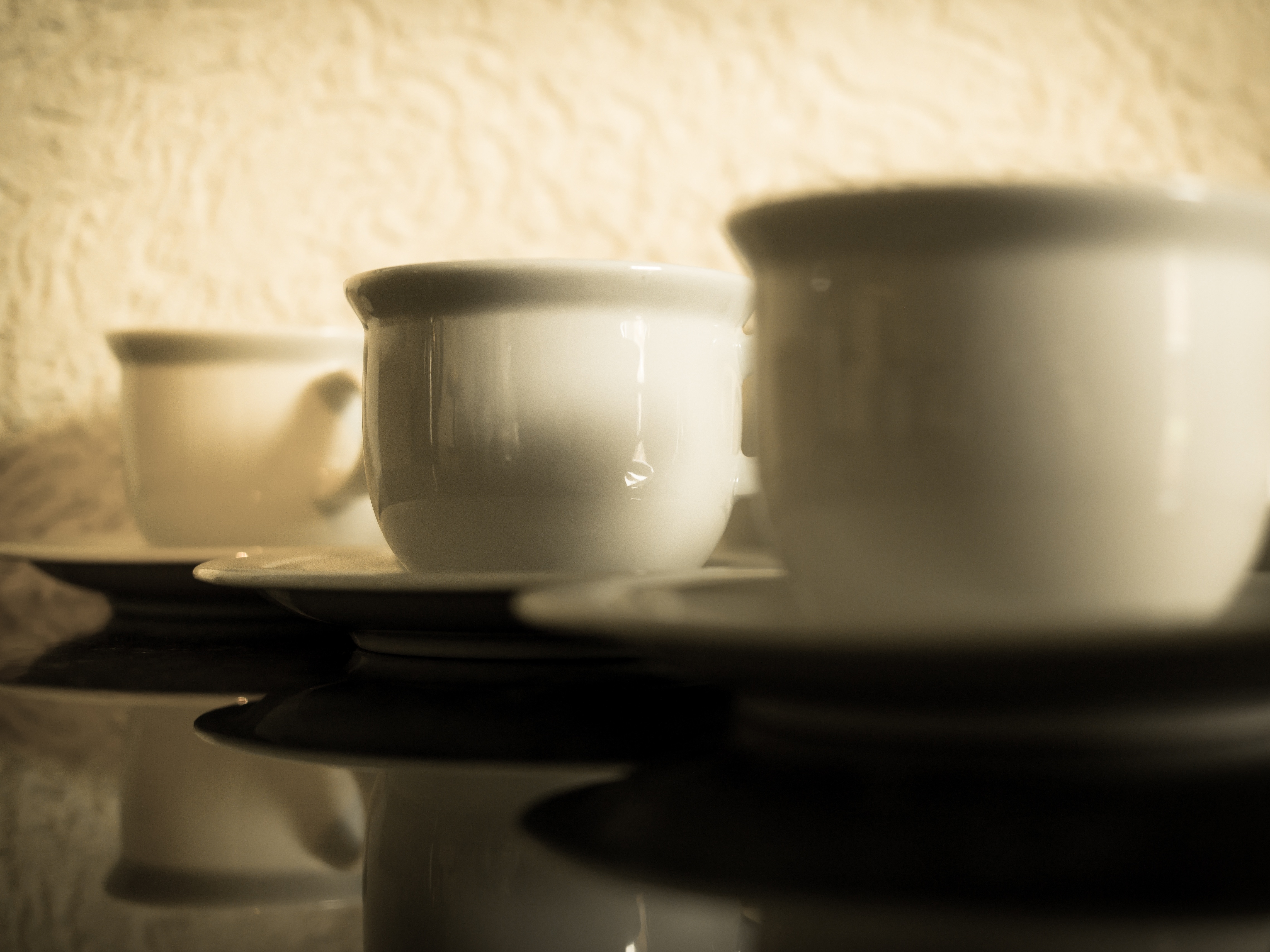 3 white ceramic coffee mugs