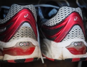 red and white asics igs thumbnail