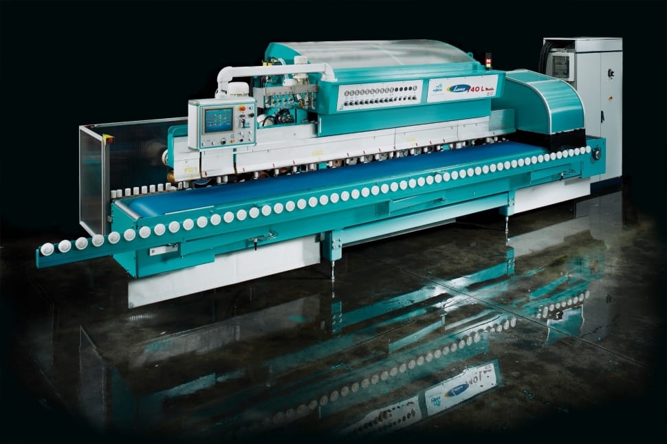 teal and white large format machine preview