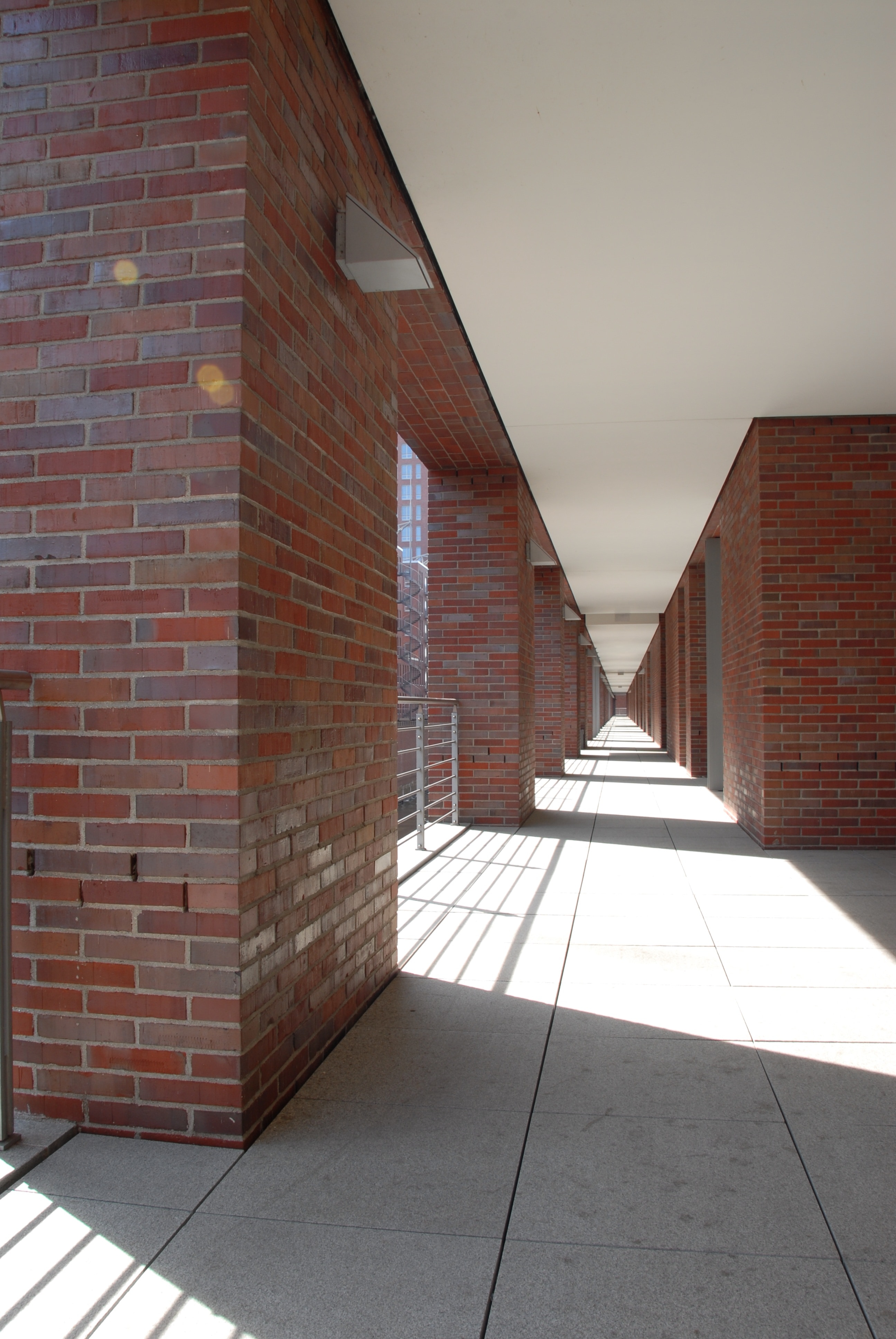 hallway with brick walls