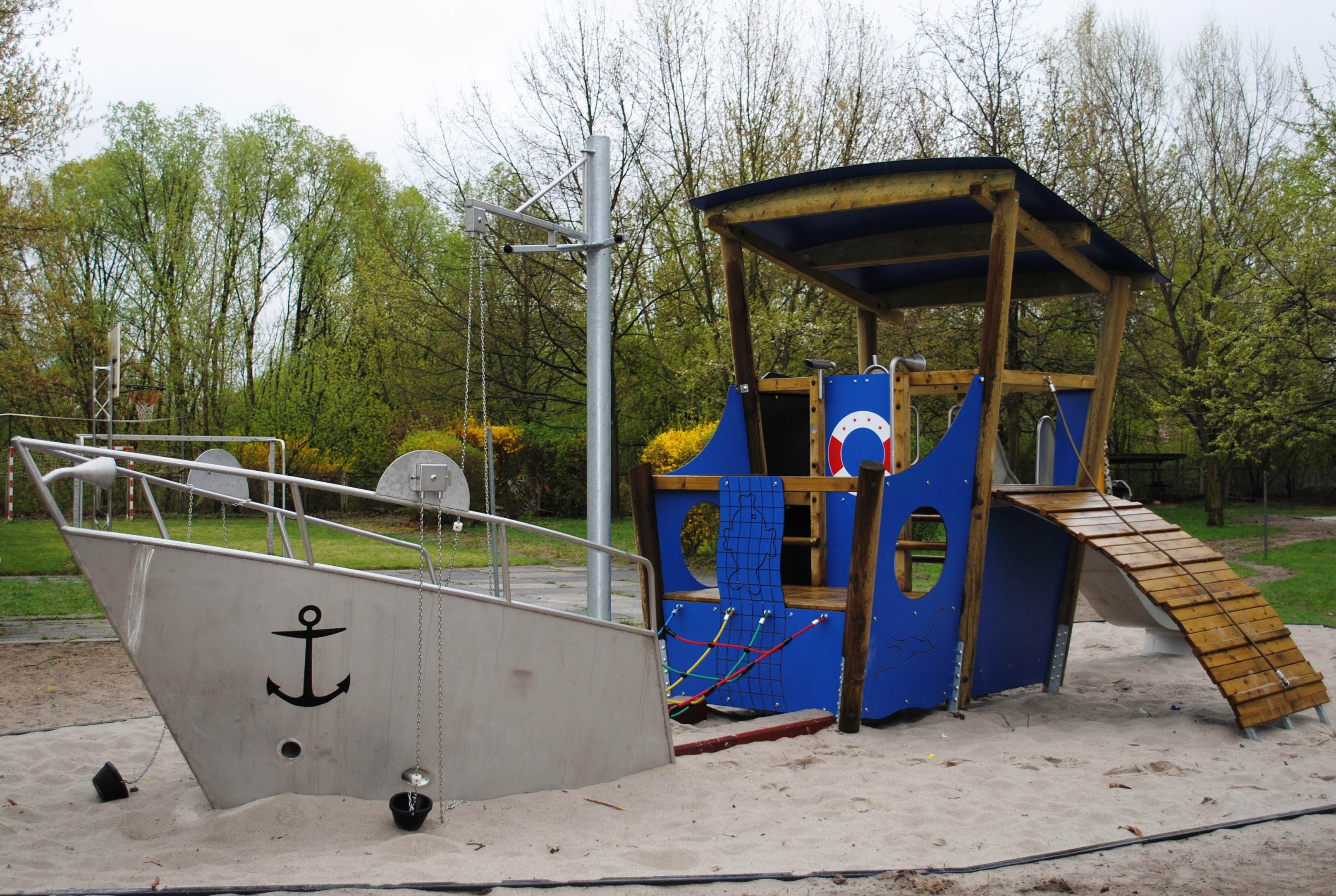 blue brown and grey ship outdoor playset