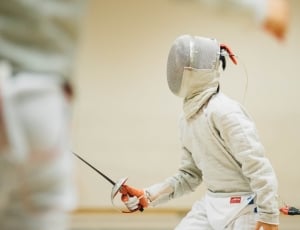 person in fencing suit thumbnail