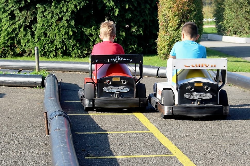two boy's playing go kart preview