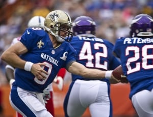 football players in blue jersey tops thumbnail