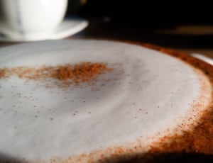 white and brown coffee latte thumbnail