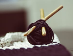 brown yarn on white textile thumbnail