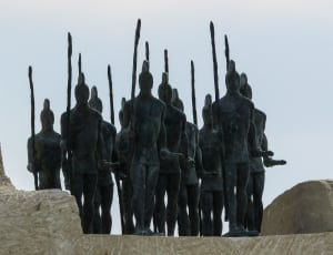 knights holding spears statues thumbnail