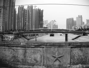 grayscale photo of high buildings thumbnail