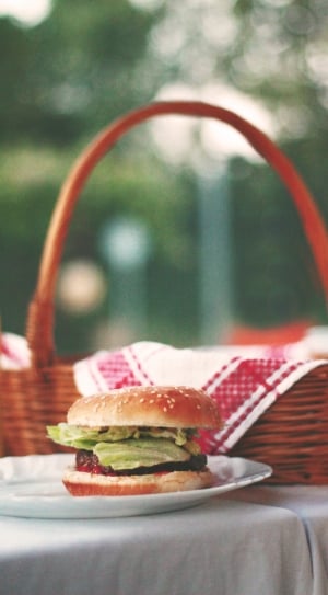 shallow focus photo of burger on white ceramic plate thumbnail