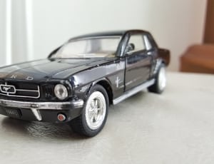 black ford mustang coupe die cast model thumbnail