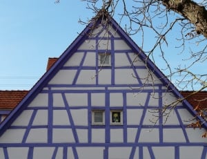 white and purple wooden house thumbnail