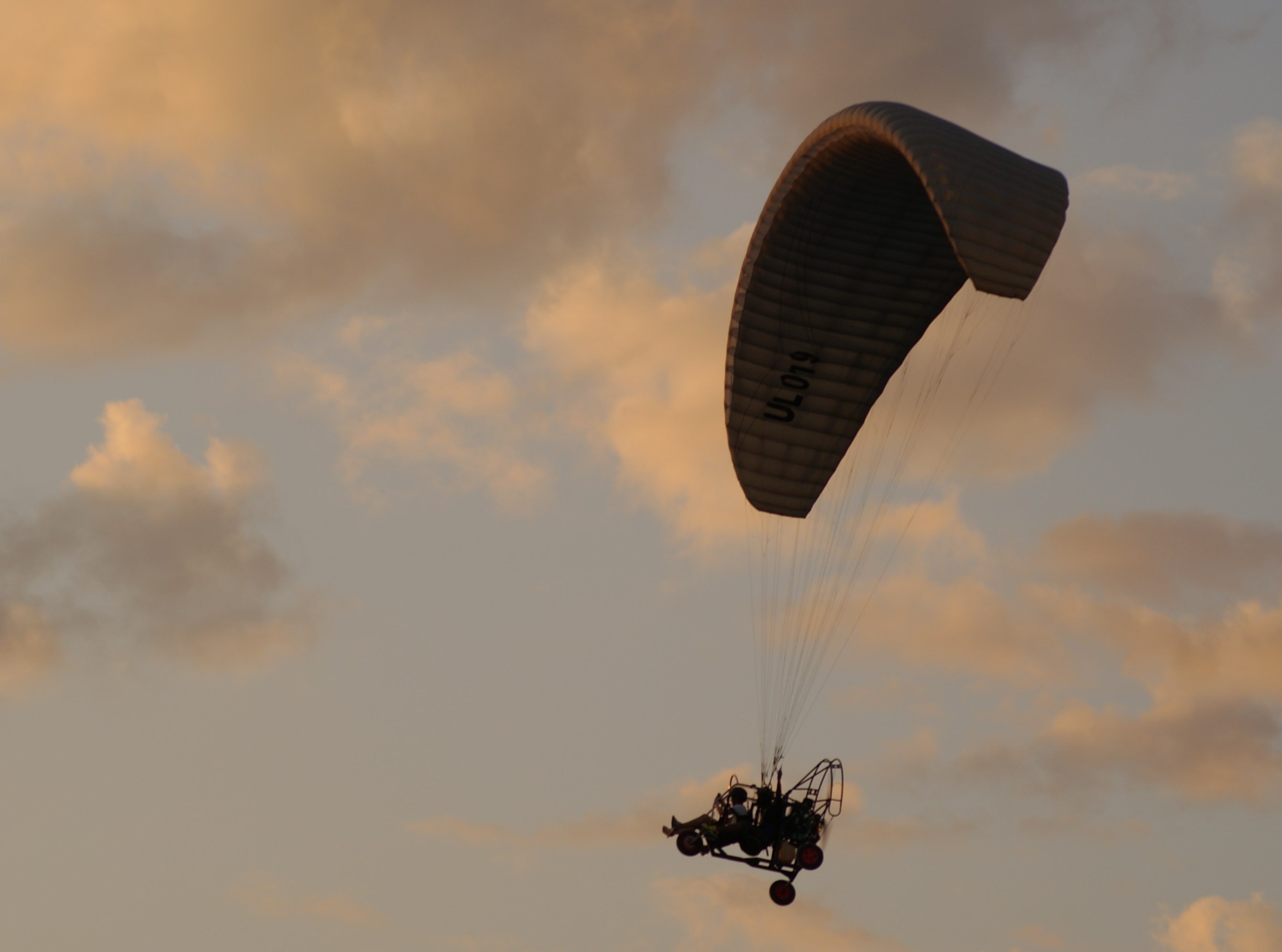 paragliding during sun set