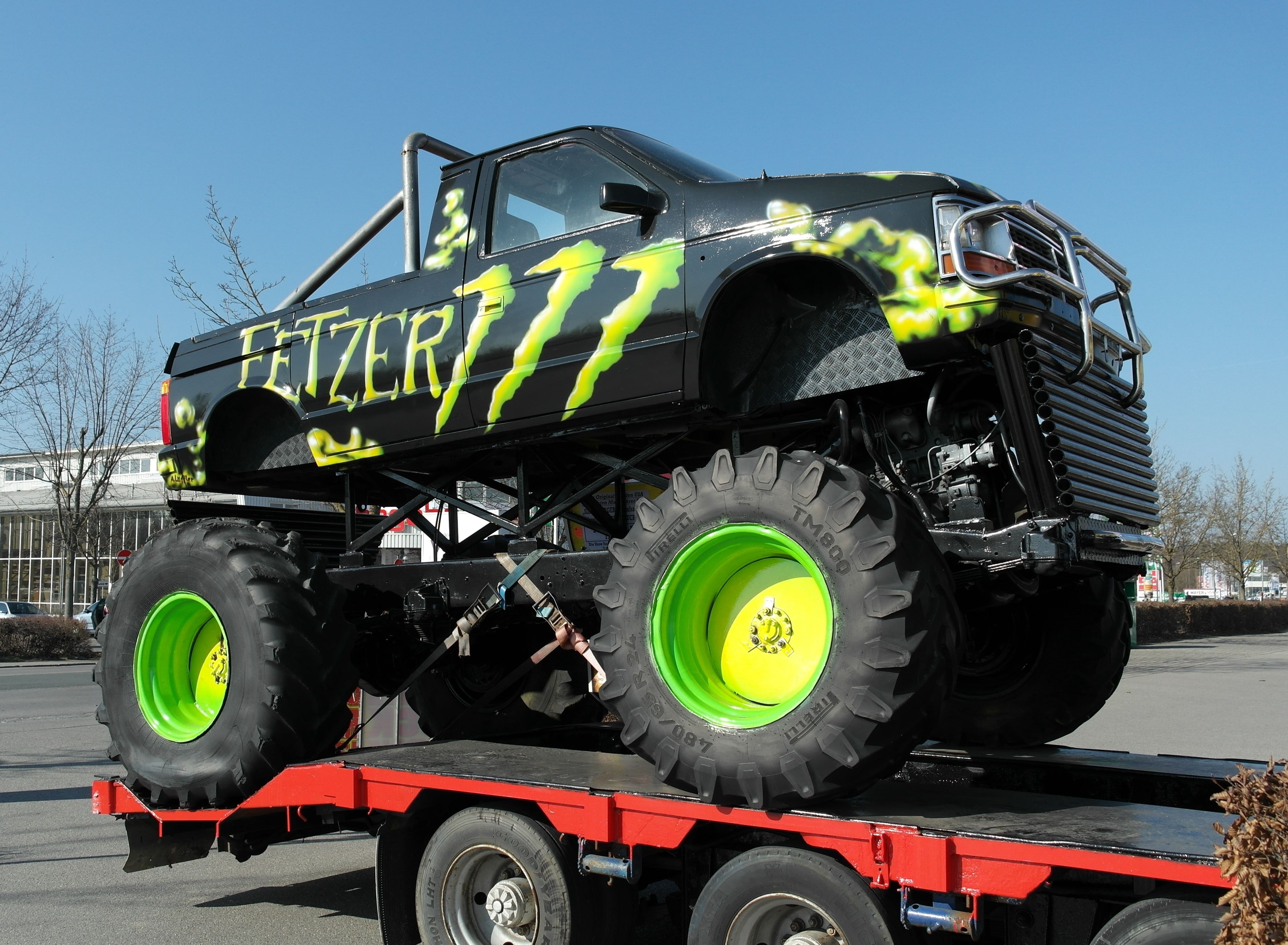 black and green fetzer monster truck