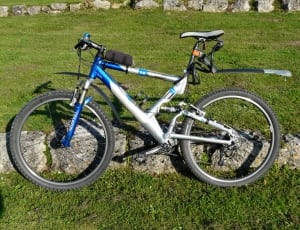 blue and gray full suspension bike thumbnail