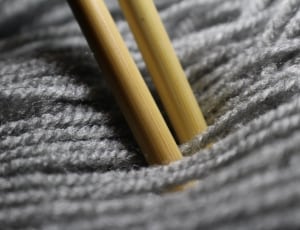 gray yarn, crochet needle thumbnail