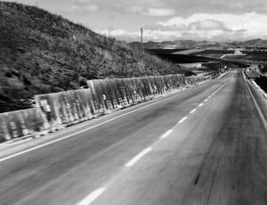 empty highway gray scale photo thumbnail