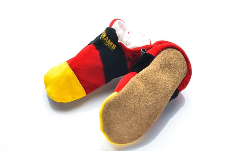 pair of black red and yellow slippers preview