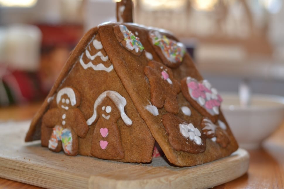 shallow focus photography of gingerbread house cookies preview