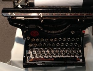 black and stainless steel typewriter thumbnail