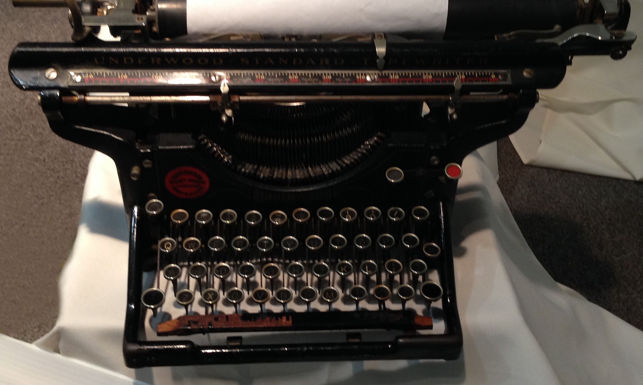 black and stainless steel typewriter