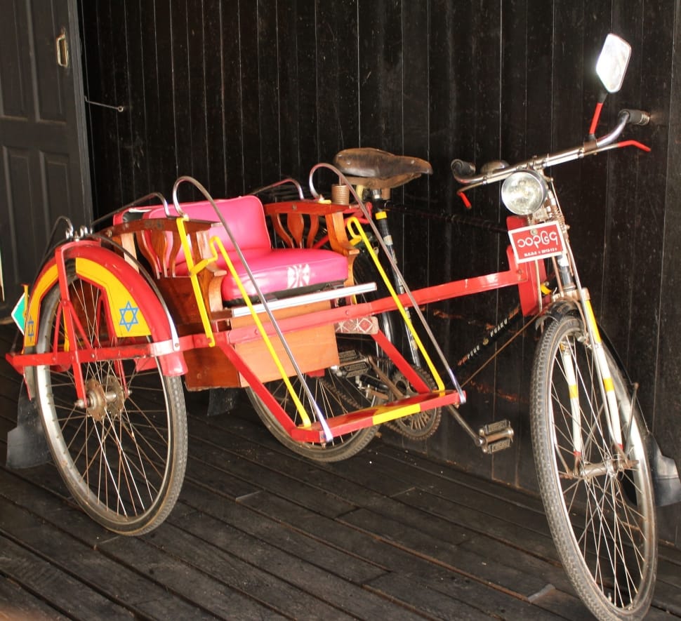 adult's red pink and yellow trike preview